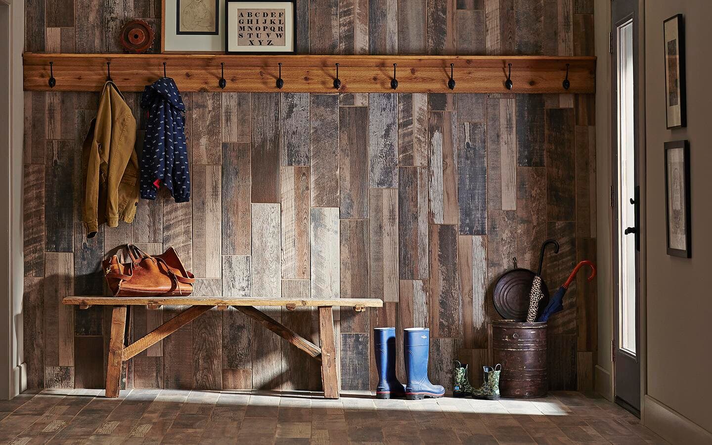 Appearance boards covering a wall in a mudroom.
