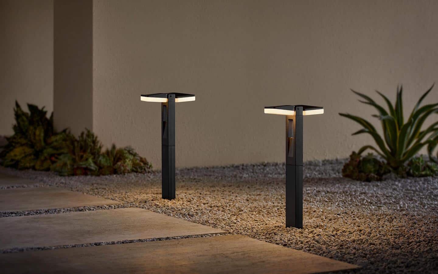 Landscape lighting at night by a garden path