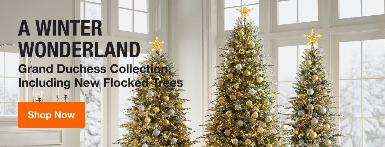 A WINTER WONDERLAND Grand Duchess Flocked Christmas Trees